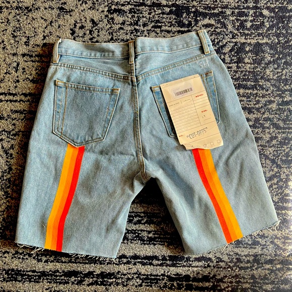 Revolve denim cutoff shorts with orange stripe
